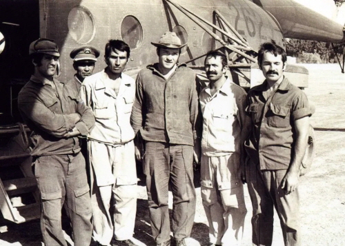 Soviet and Afghan technical crew and the 380th Afghan Hellicopter Squadron’s Mi-8T hellicopter at Dehdadi airport in the early eighties.