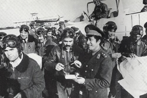 Afghan crews at Mazar-i-Sharif airport in front of L-39C Albatros and Mi-8T  Hip-C  helicopter. The Mazar-i-Sharif airport has a paved runway of around 1.86 mi (3.00 km).