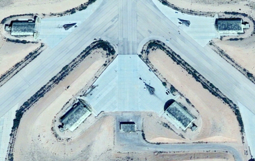 The Ghardabiya airbase's hardened shelters with three Libyan  Su-24MK from the 1124th Squadron before B-2A Spirit air strike. Photo: Maxar