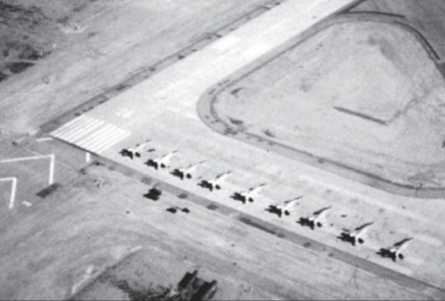Libyan 1055th Squadron s MiG-25PD  Foxbat-E  interceptor row at the end of the runway at Ghardabiya (Sirte) Air Base.