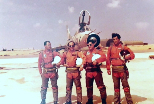 Four pilots from the Libyan 1022nd Squadron in front of their Su-22M (S-52K) reconnaissance bomber. On the left in the background is the 1055th Squadron's MiG-25 Foxbat , while on the right in the background are the NATO standard hardened shelters at the Ghardabiya air base in 1986. Four pilots from the Libyan 1022nd Squadron in front of their Su-22M (S-52K) reconnaissance bomber. On the left in the background is the 1055th Squadron's MiG-25 Foxbat , while on the right in the background are the NATO standard hardened shelters at the Ghardabiya air base in 1986.
