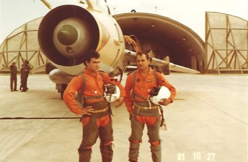 The 1022nd Squadron's two pilot with their Su-22M (S-52K) reconnaissance bomber aircraft in front of aircraft shelters at Ghardabiya (Sirte) Air Base in 1981. The 1022nd Squadron's two pilot with their Su-22M (S-52K) reconnaissance bomber aircraft in front of aircraft shelters at Ghardabiya (Sirte) Air Base in 1981.