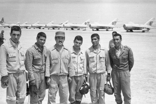 Basic version MiG-17 Fresco-A trainer aircraft of the Afghan 393rd Training Air Regiment and their crew at Dehdadi's dusty airfield in the late 1970s. The front of the aircraft row shows the Afghan Air Force's only An-30 Clank reconnaissance aircraft.