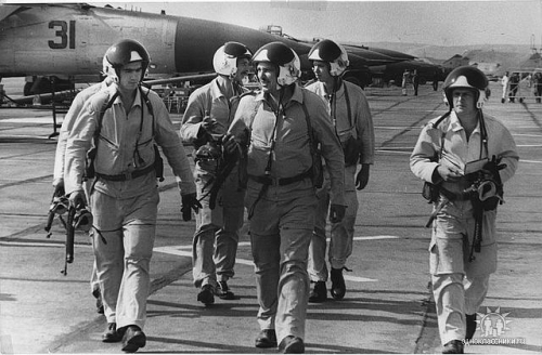 Soviet pilots in front of their improved MiG-25PDS Foxbat-E row at the Nasosnaya airport