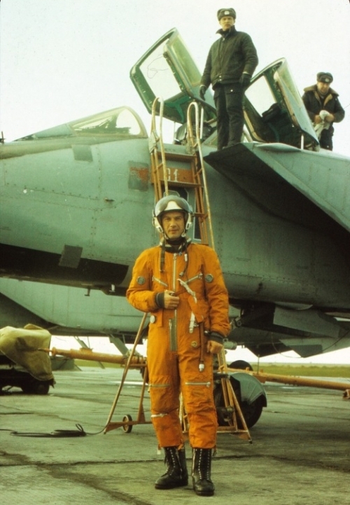 Soviet 72nd Guard Fighter Air Regiment PVOs pilot in front of their large MiG-31 Foxhound fighter aircraft at the Amderma airport in the early nineties.